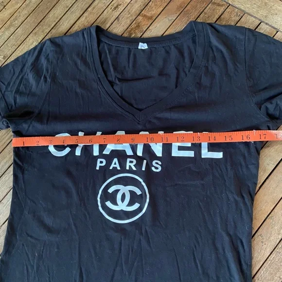 Chanel white logo on black V neck T-shirt. Size marked large, fits like sm/med. - Picture 3 of 6